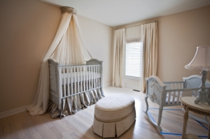 A well-decorated, luxury baby's room.
